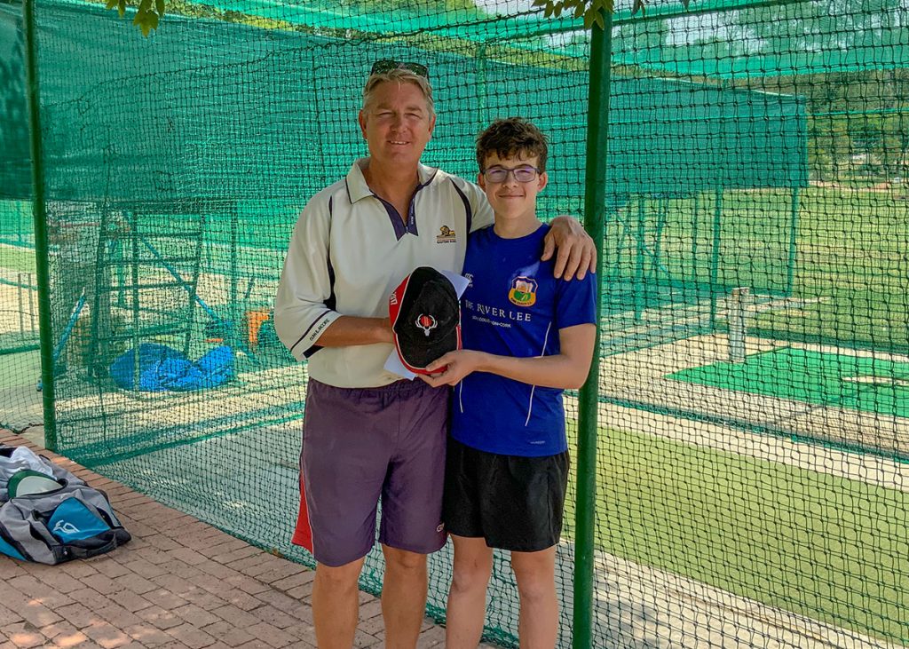 Daniel Kennedy presents Wim Jansen with a Munster cap